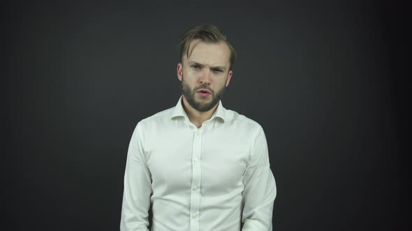 Actor Looks Straight with Sadness Posing for Photo Shoot