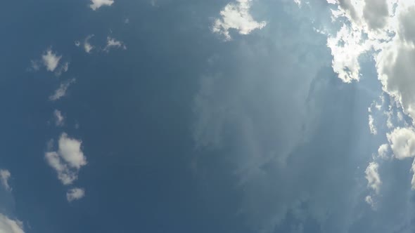 Heaven Sky Above Time Lapse of Moving Clouds and Sun Shine Loop