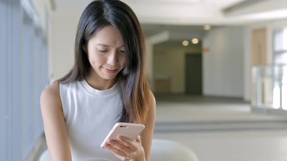 Woman using mobile phone