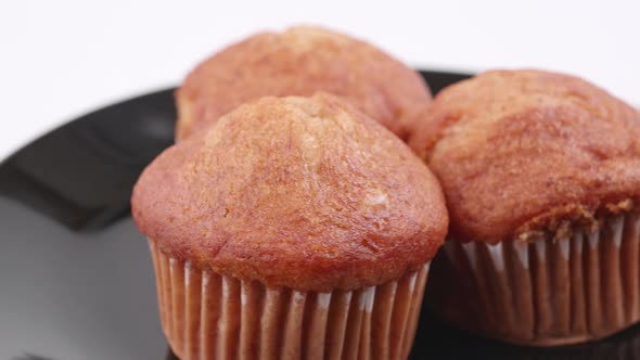 Muffins banana with white background shallow focus and slowly rotating.