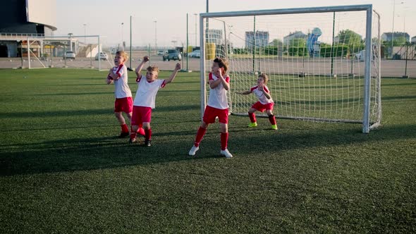 Boy Defenders Players and Goalkeeper Are Protecting Gate