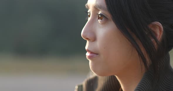 Side profile of woman look at the sunset