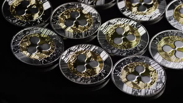 Rotating shot of Bitcoins (digital cryptocurrency) - BITCOIN RIPPLE 