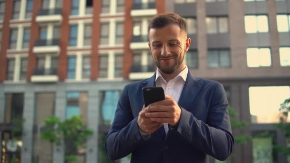 Man Received Good News on His Smartphone