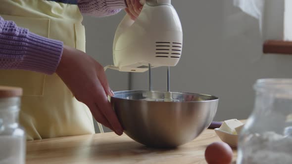 Woman Is Preparing Dough for Cake