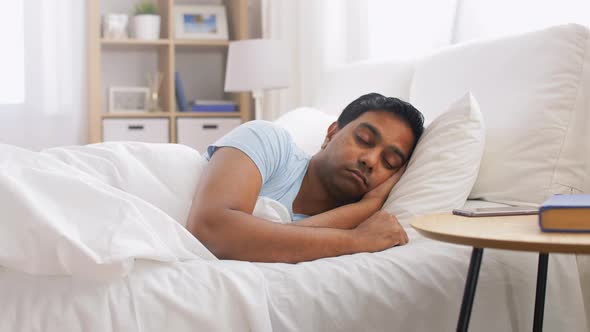 Indian Man Sleeping in Bed at Home