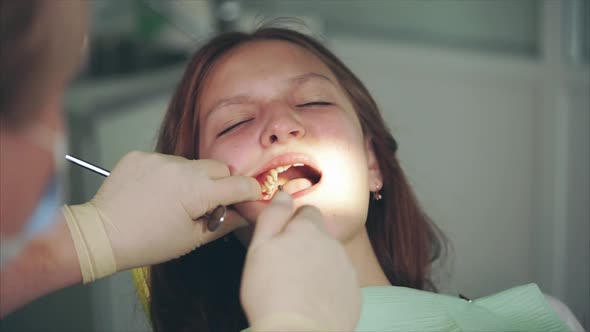 Cleaning of Teeth in Dental Cabinet