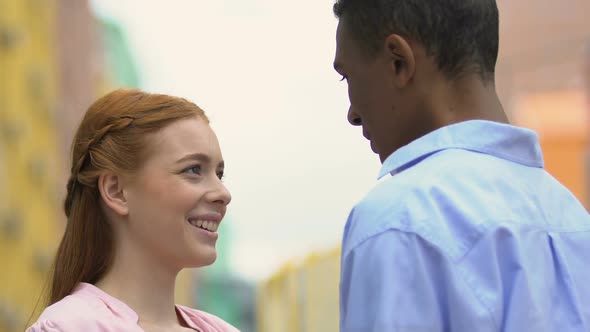 Black Young Man Happy to See Beloved Girlfriend, Teenage Couple Hugging, Date