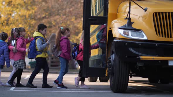 School Bus Opening Doors for Diverse Little Pupils