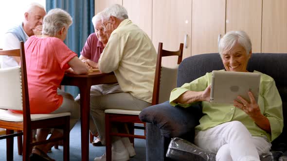 Senior woman using digital tablet