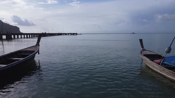 Aerial view from drones of fishing boats in the shore during low tide. alt