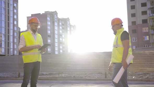 Builders Meet in the Early Morning Sunrise