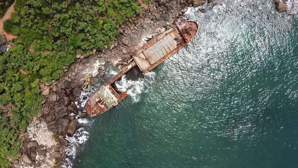 The Rusty Shipwreck Run Aground, Sri Lanka