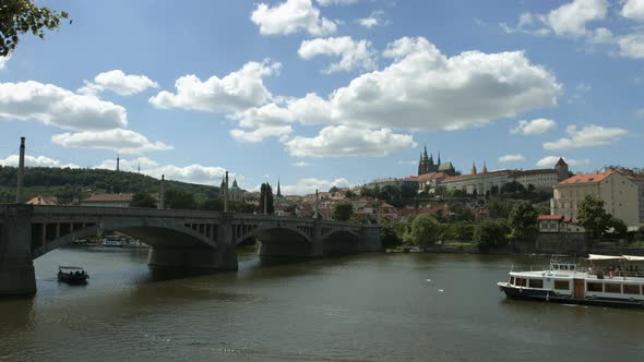 Tourist boats floating under Manes Bridge