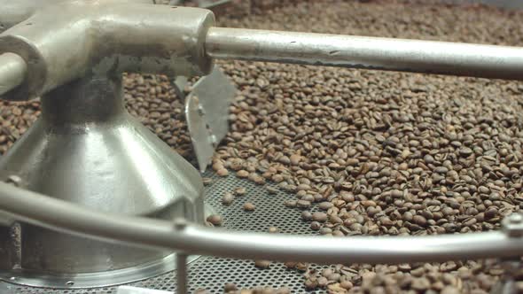 Closeup of Coffee Beans Mixing on Spinning Mechanism