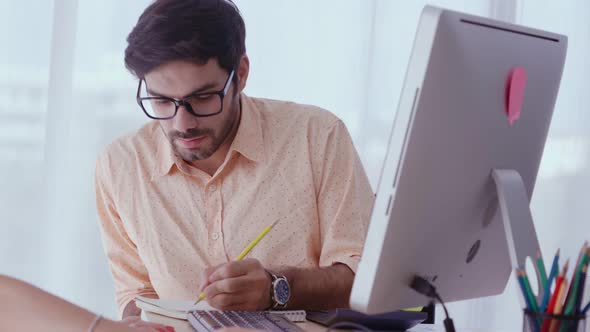 Creative Business People Group Having Conversation at Office Desk in Workplace