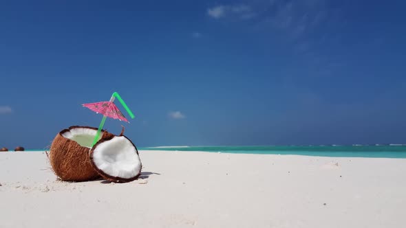 Aerial drone shot panorama of perfect coast beach adventure by blue sea and white sandy background o