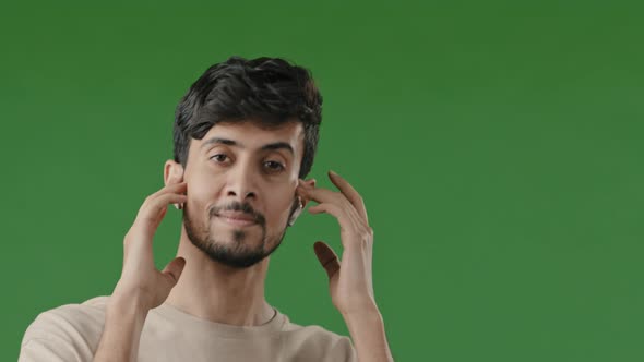 Studio Portrait Green Background Happy Carefree Arab Man Hispanic Handsome Guy Student Wear Wireless