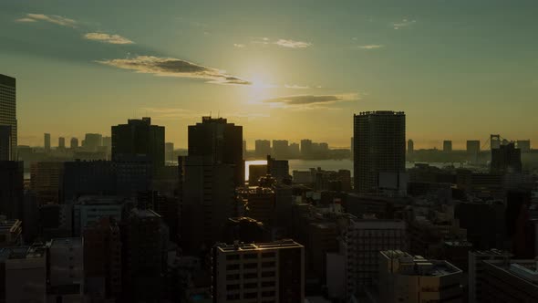 Time Lapse of the densely packs buildings of Tokyo Japan at sunrise