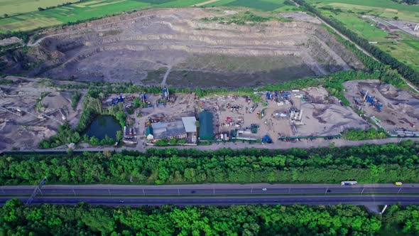 Opencast Granite Mining Quarry with Working Machinery