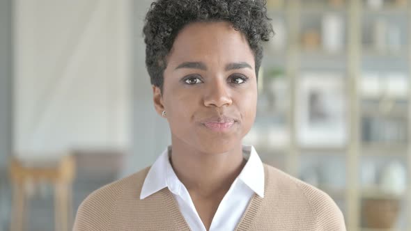 Portrait of Shot of Young African Girl Saying No By Head Sign