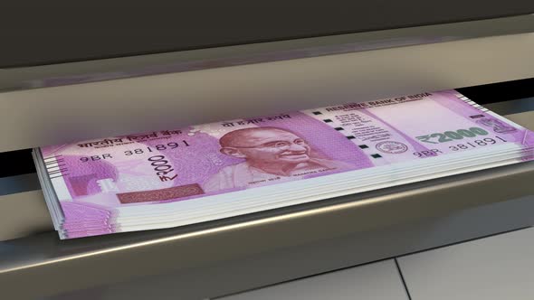 2000 Indian rupees  in cash dispenser. Withdrawal of cash from an ATM.