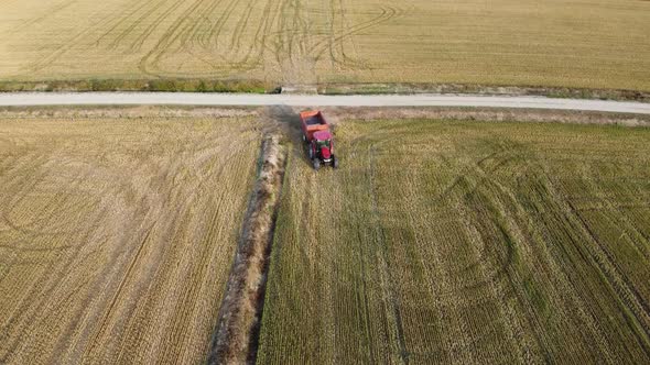 Aerial View Of A Tractor In A Field Of Rice