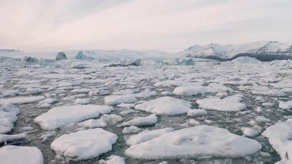 Aerial View of the J Kuls Rl n Glacial Lagoon and Floating Icebergs, The Beginning of Spring in