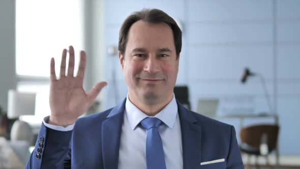Hello Businessman Waving Hand to Welcome