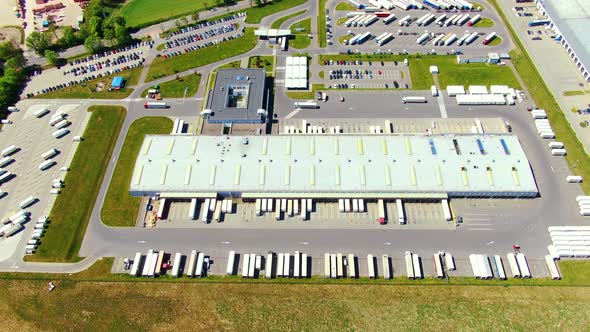 Aerial view of warehouse storages or industrial factory or logistics center from above. Top view of