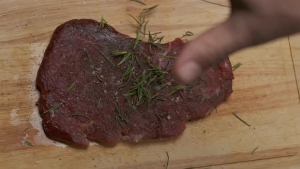 Professional Chef Applies Greens to Steak