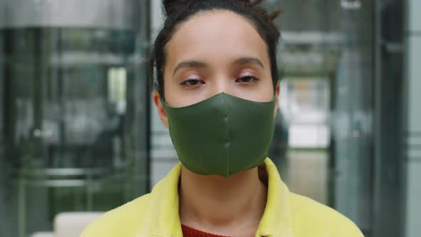 Portrait of Businesswoman in Mask in Office Center