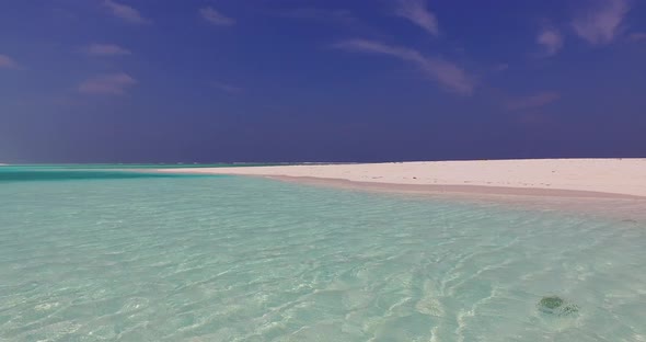 Wide above clean view of a summer white paradise sand beach and blue sea background in best quality 