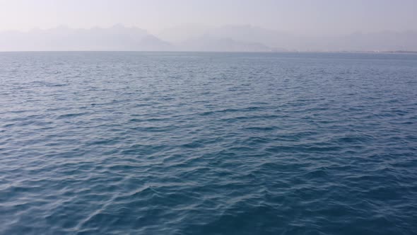 Beautiful Seascape and Mountain View on the Horizon