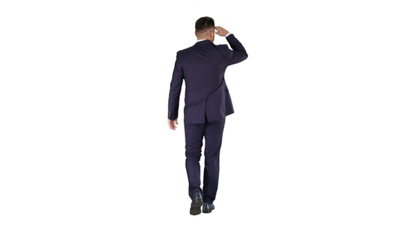 Businessman Walking and Looking Far Away on White Background