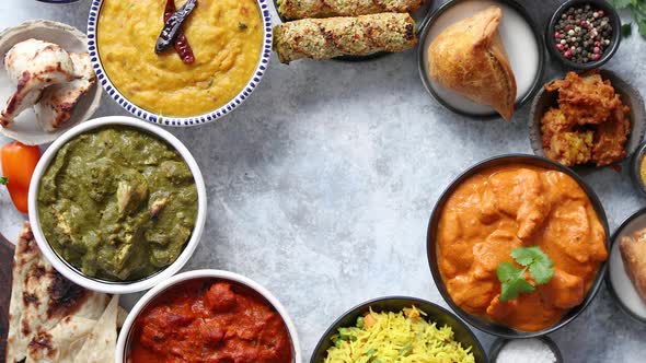 Assorted Indian Food on Stone Background. Dishes of Indian Cuisine