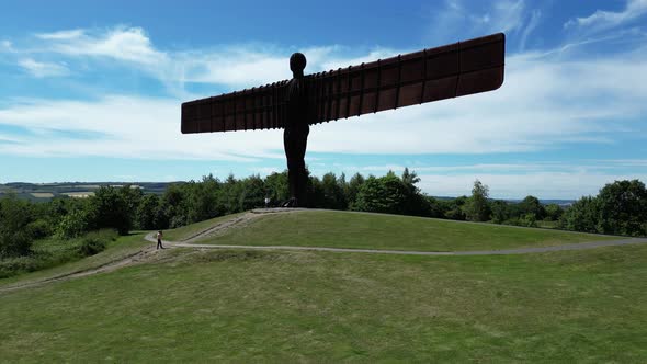 Angel of the North. Drone shot jibs up showing the front of the Angel Of The North in the North of E