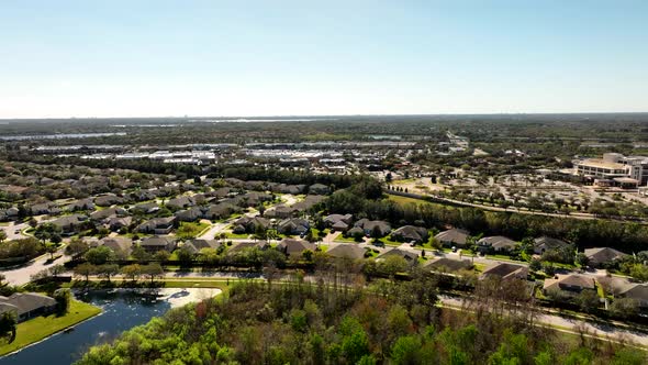 Residential Transition To Shopping Plaza. 4k Aerial Drone Video Winter Garden Florida