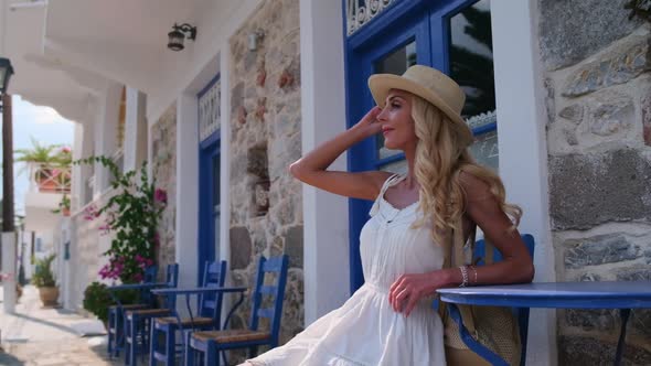 Beautiful Girl Tourist Sitting at Summer Cafe at Ermioni Greece