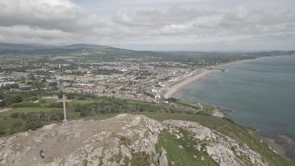 Holy Year Cross In Ireland. Concrete Cross On Top Of Bray Head Summit Overlooking Calm Sea In County