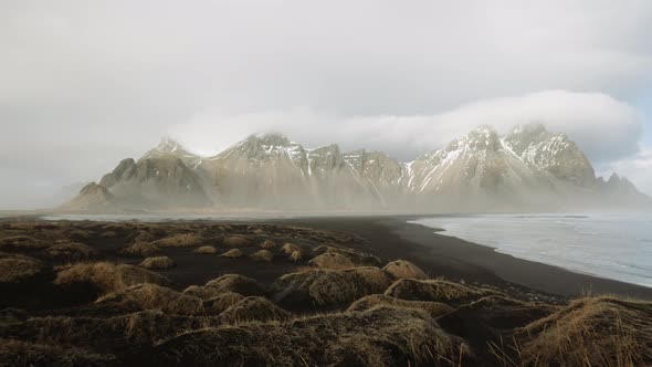 Black Sand Mounds On Beach And Vestrahorn Mountain