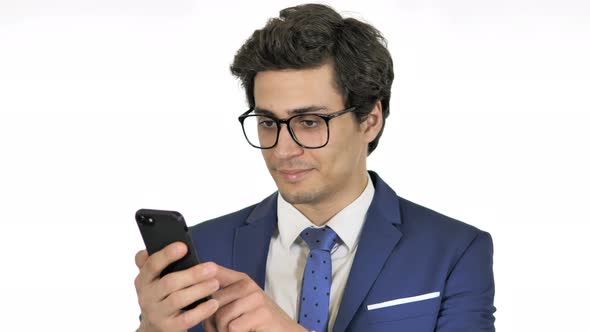 Young Businessman Using Smartphone White Background