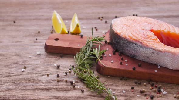 Seafood and Cooking Concept. Fresh Raw Salmon Steak with Spices