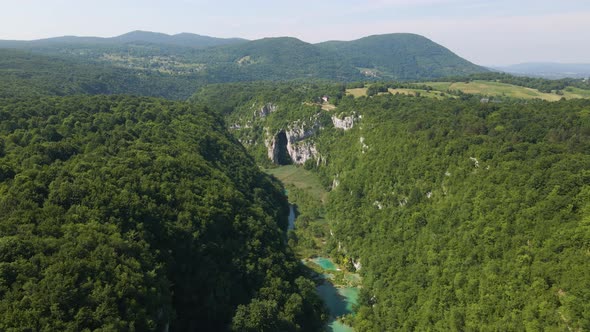 Incredible view of the beautiful Plitvice Lakes National Park with many green plants and beautiful l