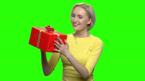 Happy Excited Mature Woman Giving You Gift Box