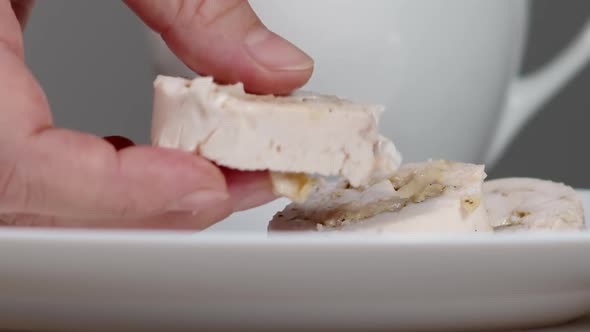 Chef Lays Out Pieces of Chicken Roll on Plate