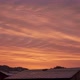 Timelapse of Moving Clouds at Sunrise Over the Roofs of Houses - VideoHive Item for Sale