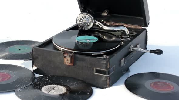 Old Gramophone Record Playing In The Snow 8