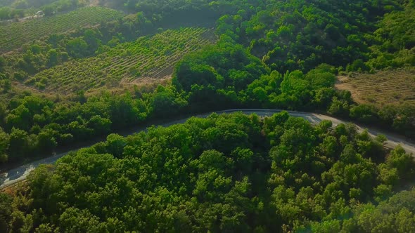 Drones Eye View - Winding Road From the High Mountain Pass To Crimea. Great Road Trip