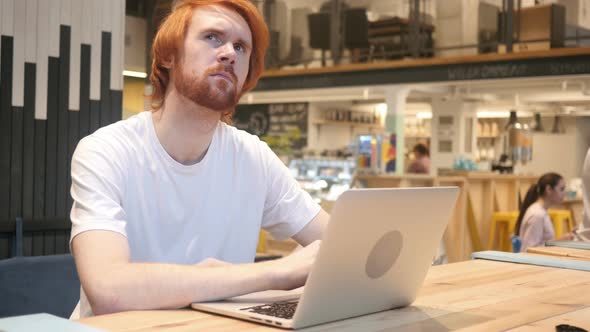 Thinking, Brainstorming Redhead Beard Man at Work